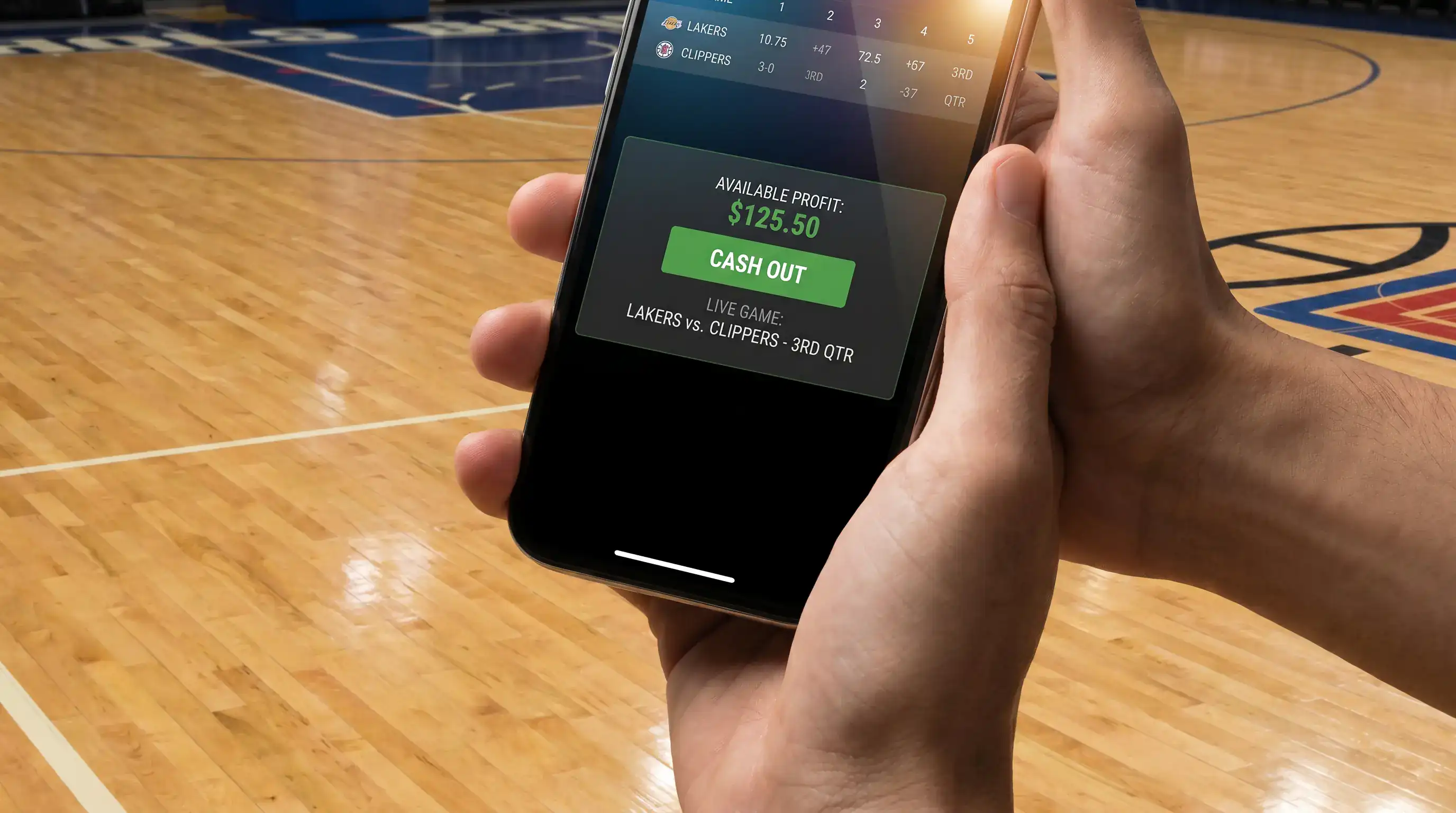Funcion de cash out en una app de apuestas de baloncesto mostrando beneficio parcial disponible